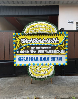 Papan Bunga Duka di Garongan